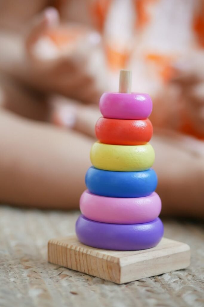 Vibrant wooden stacking rings toy for child development and learning.